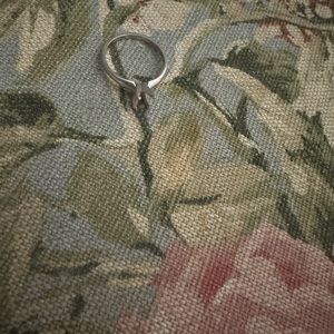 Silver ring waiting for a stone